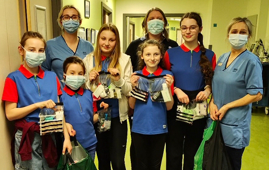 The Guides delivering Care Packs